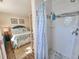Small bathroom with shower and view of bedroom at 299 Lake Arrowhead Rd., Myrtle Beach, SC 29572
