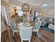 Open concept dining area with hardwood floors and glass table at 299 Lake Arrowhead Rd., Myrtle Beach, SC 29572