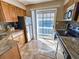 Modern kitchen with stainless steel appliances and access to balcony at 299 Lake Arrowhead Rd., Myrtle Beach, SC 29572