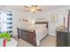 Guest bedroom with a double bed, dresser, and window with curtains at 306 River Rock Ln. # 1304, Murrells Inlet, SC 29576