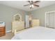 Light-filled bedroom with carpeted floors and an adjacent bathroom at 306 River Rock Ln. # 1304, Murrells Inlet, SC 29576