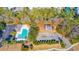 Aerial view of community pool, clubhouse, and playground at 306 River Rock Ln. # 1304, Murrells Inlet, SC 29576
