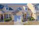 Exterior view of home with garage and landscaping at 306 River Rock Ln. # 1304, Murrells Inlet, SC 29576