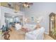 Bright living room with vaulted ceilings, hardwood floors, and white sofas at 306 River Rock Ln. # 1304, Murrells Inlet, SC 29576