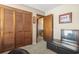 Bedroom with mirrored doors and seating at 311 Flagstone Dr., Myrtle Beach, SC 29588