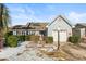 Ranch style home with attached garage and manicured landscaping at 311 Flagstone Dr., Myrtle Beach, SC 29588