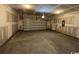 Unfinished two-car garage with light colored concrete floor at 314 Valerio St., Myrtle Beach, SC 29579