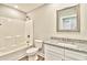 Bathroom with granite countertop, white cabinets, and a shower/tub combo at 340 William Nobles Rd., Aynor, SC 29511
