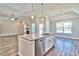 Modern kitchen with island, granite countertops, and stainless steel appliances at 340 William Nobles Rd., Aynor, SC 29511