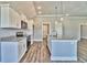 Modern kitchen featuring white cabinets, granite countertops, and stainless steel appliances at 340 William Nobles Rd., Aynor, SC 29511