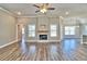 Bright living room with hardwood floors and fireplace at 340 William Nobles Rd., Aynor, SC 29511