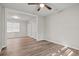 Bedroom with hardwood floors, ceiling fan, and double closets at 4300 Crows Nest Ct., Myrtle Beach, SC 29579