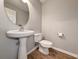 Clean and modern powder room with pedestal sink at 437 Red Rose Blvd. # 5, Pawleys Island, SC 29585
