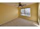 Well-lit bedroom featuring neutral walls and carpet at 437 Red Rose Blvd. # 5, Pawleys Island, SC 29585