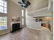 Open living room with a fireplace and kitchen views at 437 Red Rose Blvd. # 5, Pawleys Island, SC 29585