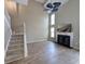 Living room with hardwood floors and fireplace at 437 Red Rose Blvd. # 5, Pawleys Island, SC 29585