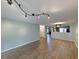 Spacious living room with hardwood floors and track lighting at 437 Red Rose Blvd. # 5, Pawleys Island, SC 29585