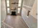 Spacious living room with hardwood floors, fireplace, and high ceilings at 437 Red Rose Blvd. # 5, Pawleys Island, SC 29585