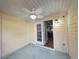 Screened porch with French doors leading to kitchen at 437 Red Rose Blvd. # 5, Pawleys Island, SC 29585