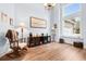 Relaxing living area featuring hardwood floors and a rocking chair at 441 Battey Dr., Myrtle Beach, SC 29588