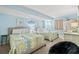 Guest bedroom with two twin beds, beach-themed bedding, and ample closet space at 501 S Ocean Blvd. # 505, North Myrtle Beach, SC 29582