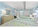 Bright bedroom with two twin beds, dresser, and beachy decor at 501 S Ocean Blvd. # 505, North Myrtle Beach, SC 29582
