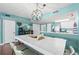 Coastal-themed dining area with white table and ocean view at 501 S Ocean Blvd. # 505, North Myrtle Beach, SC 29582