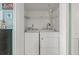 Small laundry closet with washer and dryer at 501 S Ocean Blvd. # 505, North Myrtle Beach, SC 29582