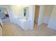 Main bathroom with double vanity, separate toilet area, and access to bedroom at 511 Firouz Dr, Longs, SC 29568
