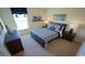 Bedroom with a full-size bed and dark wood furniture at 511 Firouz Dr, Longs, SC 29568