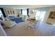 Open concept dining area with table and chairs, adjacent to living room at 511 Firouz Dr, Longs, SC 29568