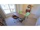 Bright office space with a wood desk and green chairs at 511 Firouz Dr, Longs, SC 29568