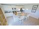 Kitchen island with granite countertop and white cabinets at 511 Firouz Dr, Longs, SC 29568