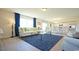 Spacious living room with a large window and a blue rug at 511 Firouz Dr, Longs, SC 29568