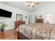 Spacious bedroom with hardwood floors, large bed, and plenty of dresser space at 535 Belton Dr., Conway, SC 29526