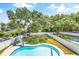 Aerial view showcasing a kidney-shaped pool and expansive backyard at 5907 Haskell Circle, Myrtle Beach, SC 29572
