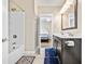 Bathroom with a double vanity and a view into bedroom at 5907 Haskell Circle, Myrtle Beach, SC 29572