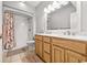 Bathroom boasts double sinks, shower, and updated vanity at 5907 Haskell Circle, Myrtle Beach, SC 29572