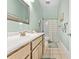 Clean bathroom with a shower/tub combo and light wood vanity at 5907 Haskell Circle, Myrtle Beach, SC 29572