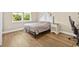 Bedroom with a double bed, nightstand and hardwood floors at 5907 Haskell Circle, Myrtle Beach, SC 29572