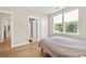 Cozy bedroom with a double bed and large windows at 5907 Haskell Circle, Myrtle Beach, SC 29572