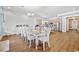 Dining area with white table and chairs, hardwood floors at 5907 Haskell Circle, Myrtle Beach, SC 29572