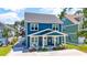 Two-story blue house with white trim and a front porch at 5907 Haskell Circle, Myrtle Beach, SC 29572