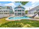 Stunning backyard oasis with pool, hot tub, and slide at 5907 Haskell Circle, Myrtle Beach, SC 29572
