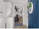 Bright entryway with view of living area and laundry at 6001-1235 S Kings Highway, Myrtle Beach, SC 29575
