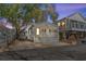 House exterior at night, string lights on porch at 6001-1235 S Kings Highway, Myrtle Beach, SC 29575