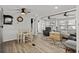 Open living area with hardwood floors and comfy seating at 6001-1235 S Kings Highway, Myrtle Beach, SC 29575