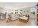 Spacious living room featuring a beige couch and a wooden coffee table at 6048 Forest Dell Ct, Myrtle Beach, SC 29579