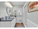 Bathroom with white vanity, gray countertop, and a walk-in shower at 637 Sparrow Dr., Surfside Beach, SC 29575