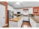 Modern kitchen with stainless steel appliances and butcher block island at 637 Sparrow Dr., Surfside Beach, SC 29575